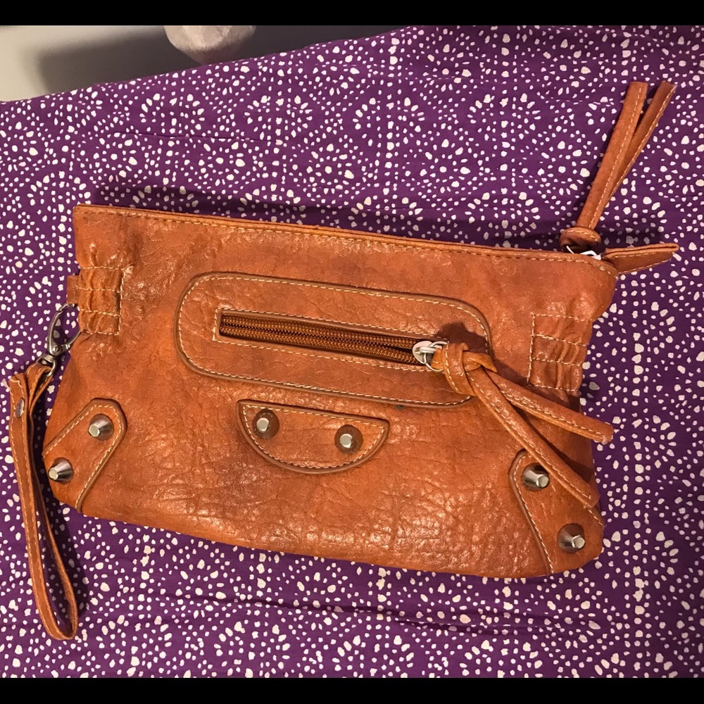 Brown leather clutch